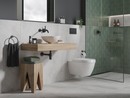 Czarny syfon umywalkowy - stylowy detal w nowoczesnej łazience
